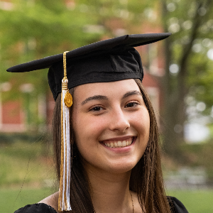 Bella, Georgia Tech 2024 grad, in cap and gown